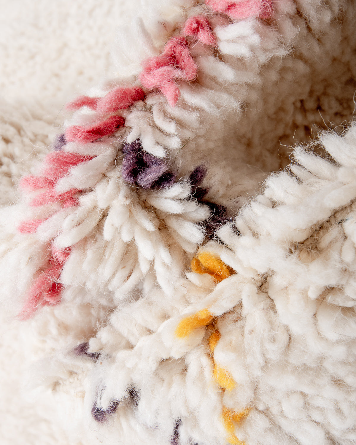 Modern, designer, handcrafted Berber rug from Morocco. Beniourain carpet with beautiful colours and patterns and fluffy wool texture.